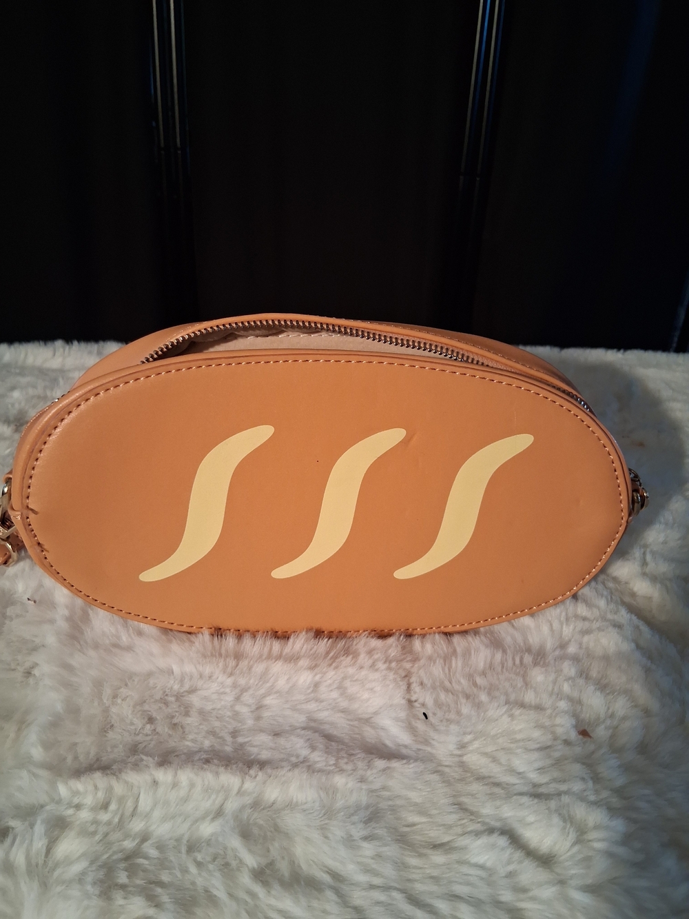FUJIBEE Peach Oval Bread Crossbody Bag with Cream Wave Accents